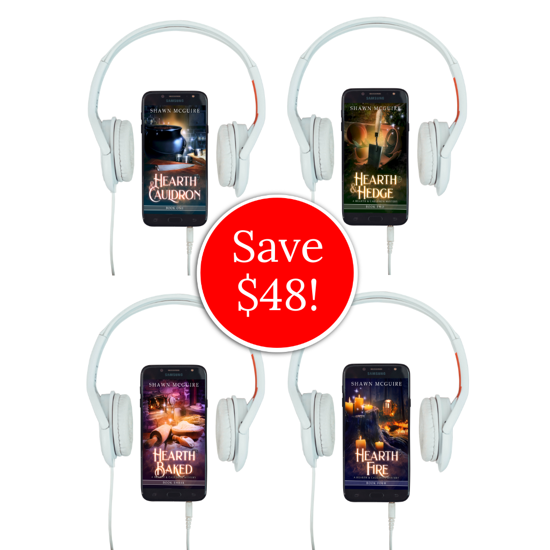 Book covers of Shawn McGuire’s 4-book cozy witch-themed murder mystery series on cellphones.