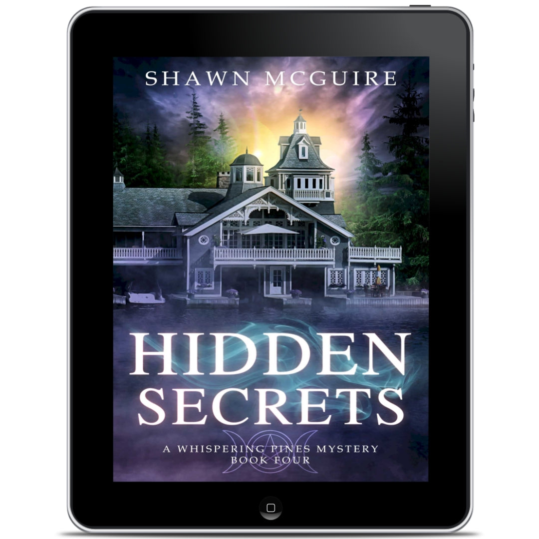 E-book cover on e-reader of Shawn McGuire's cozy murder mystery featuring a beautiful house on a lake.