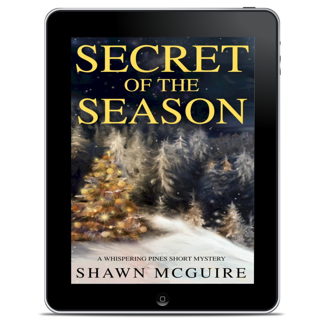 E-book cover on e-reader of Shawn McGuire's cozy murder mystery holiday novella featuring a Christmas tree with gold ornaments in a snowy forest.