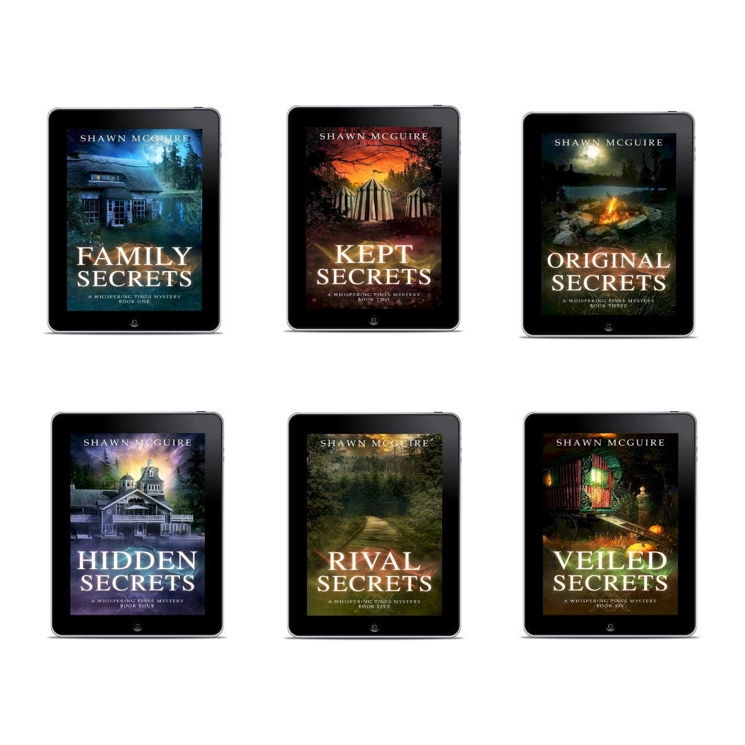 E-book covers on e-readers of Shawn McGuire’s 6-book cozy murder mystery series collection books 1-6.