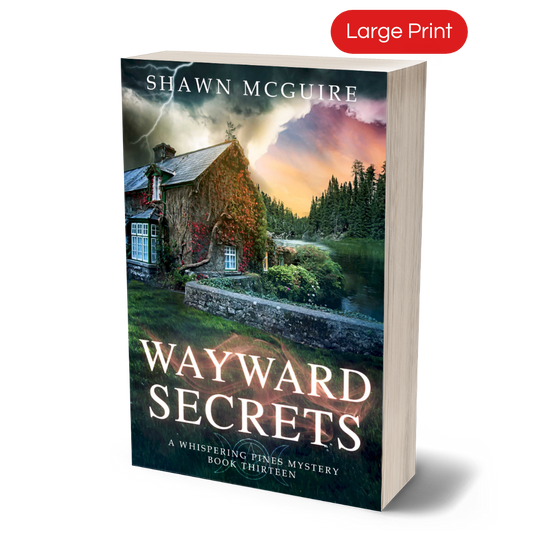 Large print paperback cover of Shawn McGuire's cozy murder mystery featuring a stone cottage on a lake beneath an ominous sky.