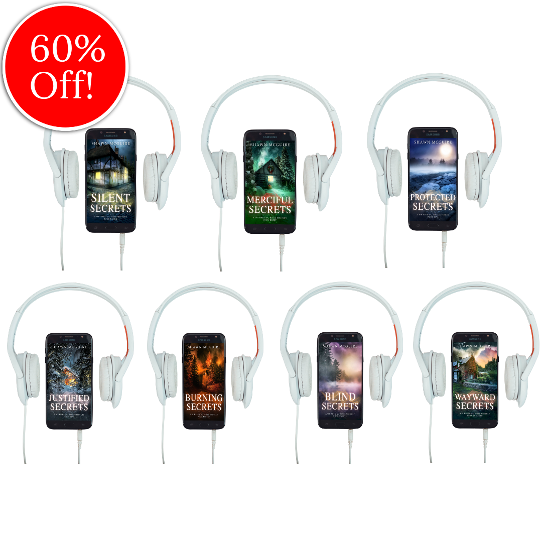 Audiobook covers on cellphones of Shawn McGuire’s 13-book cozy murder mystery series collection books 7-13.