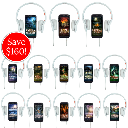 Audiobook covers on cellphones of Shawn McGuire’s 13-book cozy murder mystery series