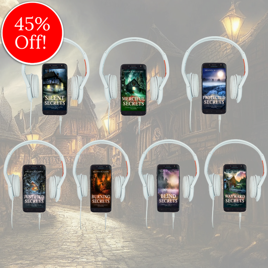 Audiobook covers on cellphones of Shawn McGuire’s 13-book cozy murder mystery series collection books 7-13.