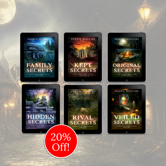 E-book covers on e-readers of Shawn McGuire’s 6-book cozy murder mystery series collection books 1-6.
